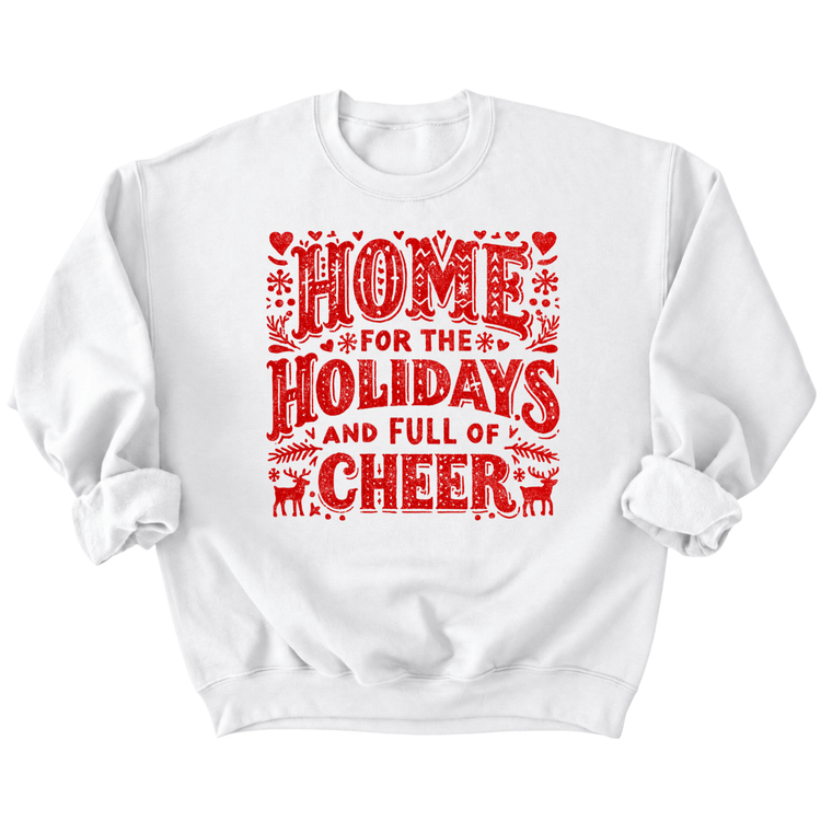 A white sweatshirt with a red and black graphic design that says "HOME FOR THE HOLIDAYS AND FULL OF CHEER".