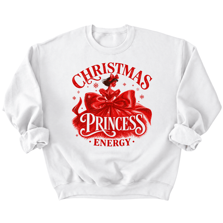 A white sweatshirt with a red graphic design featuring a red ribbon and the text "Christmas Princess Energy" printed on it.
