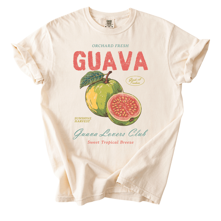 a white t-shirt with a graphic design of a guava fruit and a sliced guava.