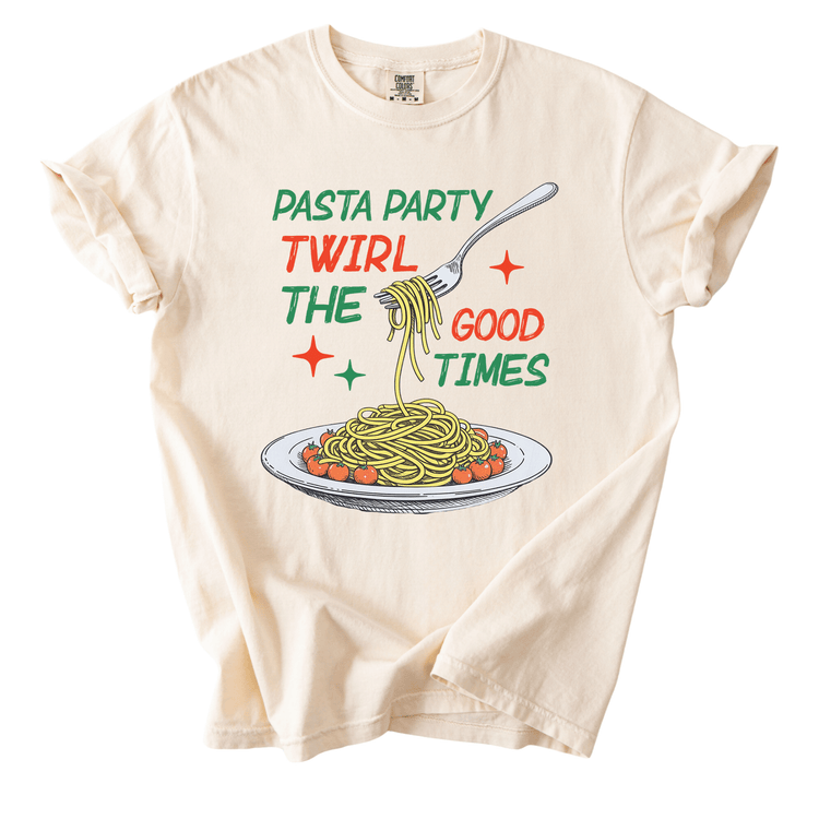 a t-shirt with a graphic design depicting a plate of spaghetti with a fork, accompanied by the text "Pasta Party Twirl The Good Times" in a playful and colorful style.