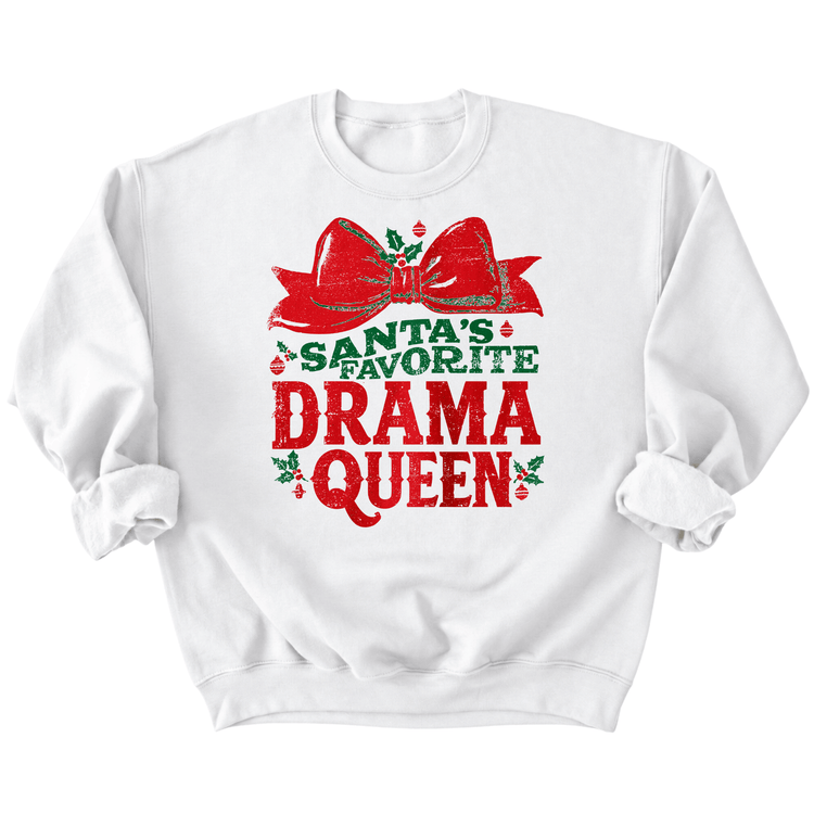 A white sweatshirt with a graphic design featuring a red bow and the text "Santa's favorite drama queen" printed on it.