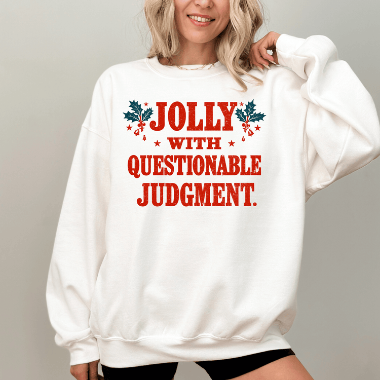 A woman wearing a white sweatshirt with the text "Jolly with Questionable Judgment" printed on it.