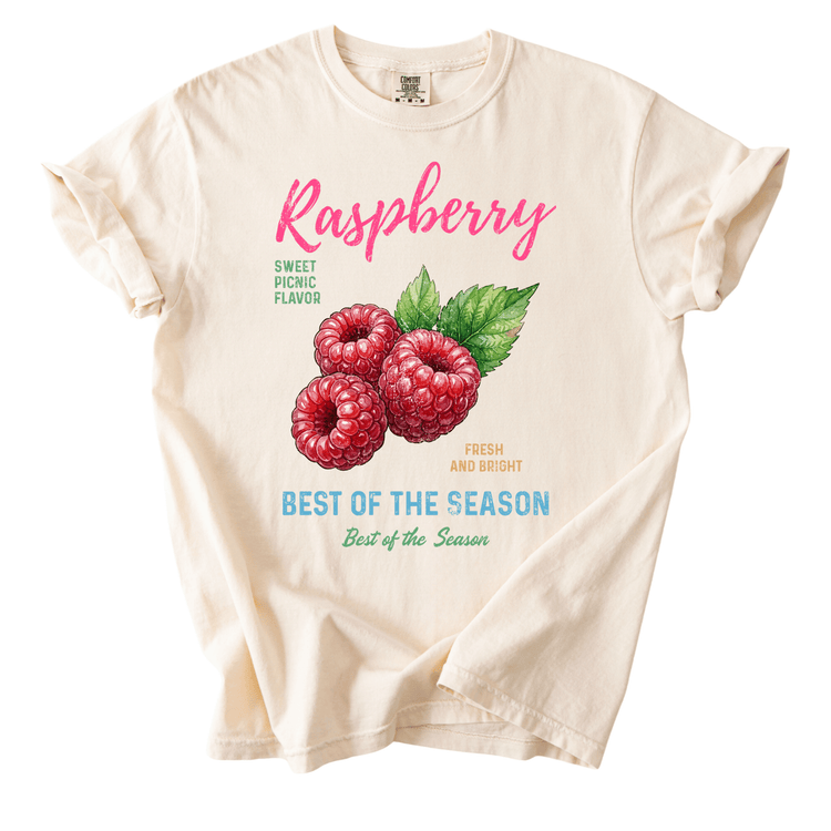 a white t-shirt with a graphic design of raspberries and the text "Raspberry" and "Best of the Season" printed on it.
