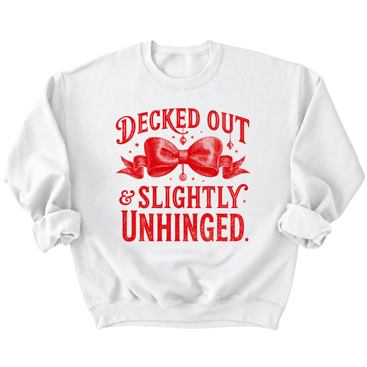 A white sweatshirt with a red graphic design featuring a bow and the text "Decked out &SLIGHTLY UNHINGED."